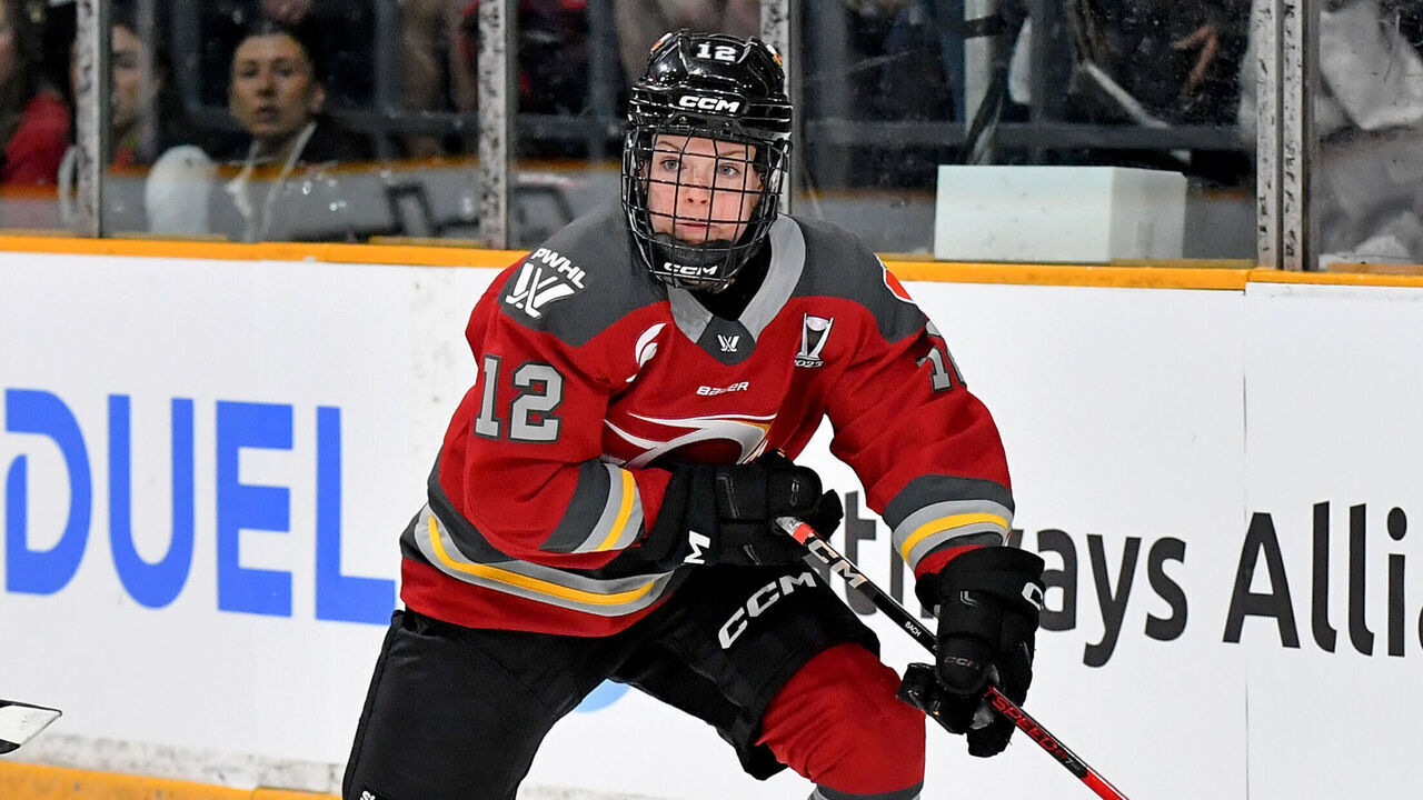 OTTAWA, ONTARIO - MAY 13: Victoria Bach #12 of the Ottawa Charge skates with the puck against the Montreal Victoire during the first period at The Arena at TD Place on May 13, 2025 in Ottawa, Ontario.