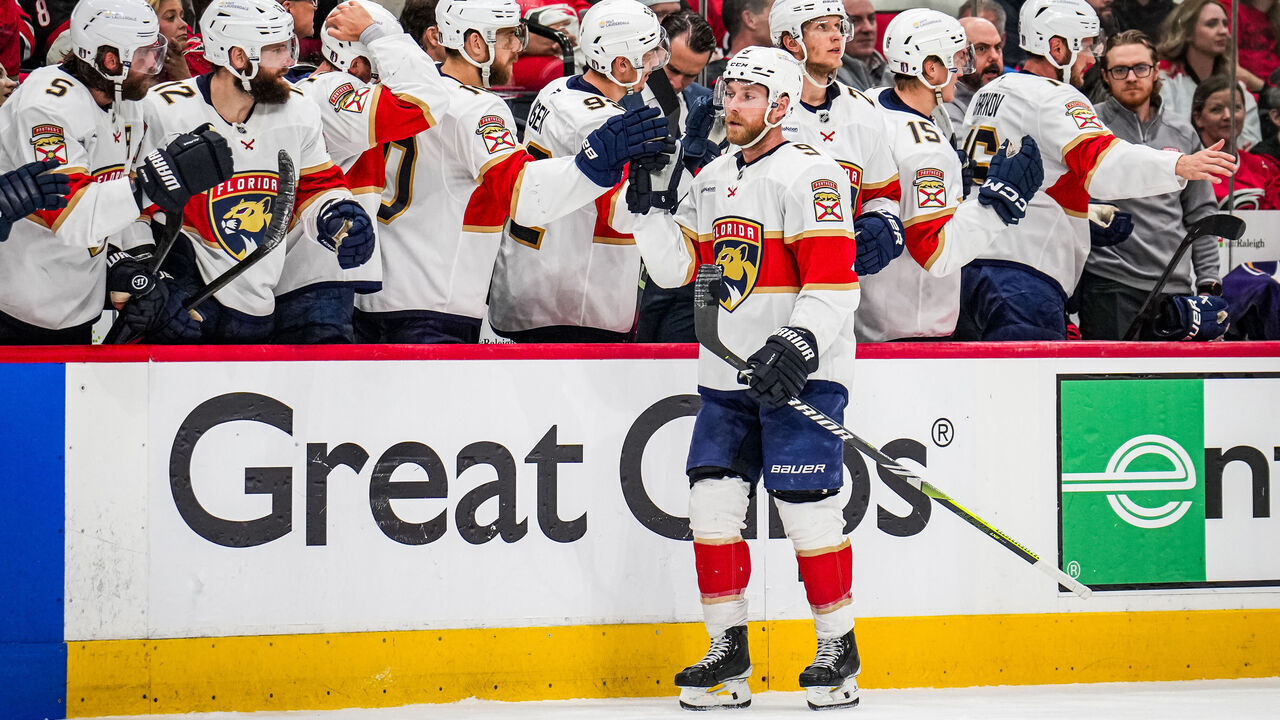 RALEIGH, NC - MAY 20: Sam Bennett #9 of the Florida Panthers high-fives his teammates after scoring a goal during the third period of Game One of the Eastern Conference Final of the 2025 Stanley Cup Playoffs against the Carolina Hurricanes at Lenovo Center on May 20, 2025 in Raleigh, North Carolina.
