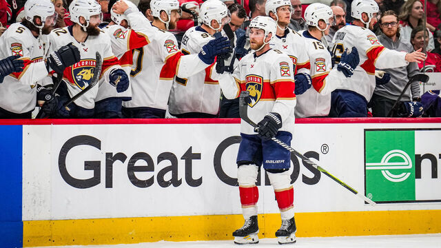 RALEIGH, NC - MAY 20: Sam Bennett #9 of the Florida Panthers high-fives his teammates after scoring a goal during the third period of Game One of the Eastern Conference Final of the 2025 Stanley Cup Playoffs against the Carolina Hurricanes at Lenovo Center on May 20, 2025 in Raleigh, North Carolina.