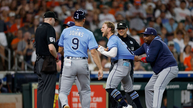 HOUSTON, TEXAS - JUNE 01: Taylor Walls #6 of the Tampa Bay Rays reacts after being ejected while manager Kevin Cash #16 of the Tampa Bay Rays argues with umpire Nic Lentz #59 in the ninth inning against the Houston Astros at Daikin Park on June 01, 2025 in Houston, Texas.