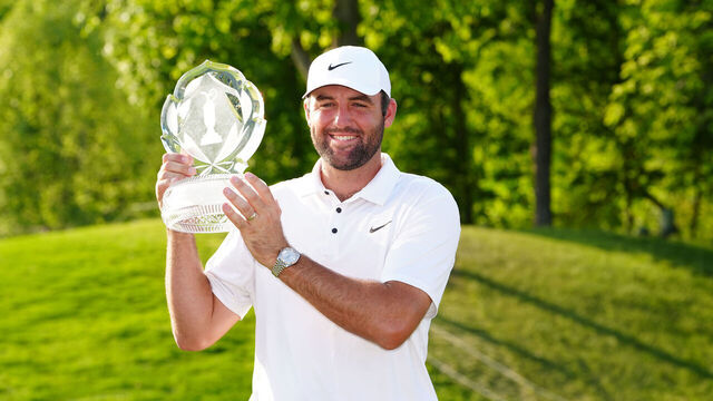 DUBLIN, OH - JUNE 01: PGA golfer Scottie Scheffler poses with the trophy after winning the Memorial Tournament presented by Workday on June 1, 2025, at Muirfield Village Golf Club in Dublin, Ohio.