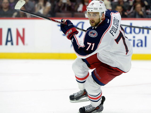 Blue Jackets' Foligno stretchered off after colliding with linesman