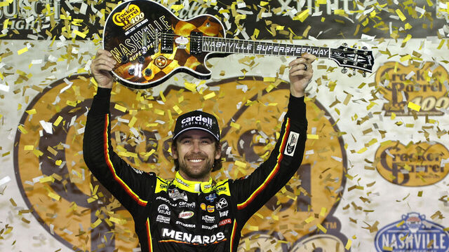 LEBANON, TENNESSEE - JUNE 01: Ryan Blaney, driver of the #12 Menards/Cardell Cabinetry Ford, celebrates in victory lane after winning NASCAR Cup Series Cracker Barrel 400 at Nashville Superspeedway on June 01, 2025 in Lebanon, Tennessee.