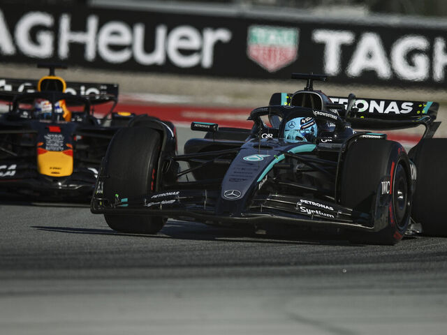 George Russell of the Mercedes AMG F1 Team W16 and Max Verstappen of Red Bull Racing RB21 compete during the Formula 1 Aramco Gran Premio de Espana on May 30, 2025, at the Circuit de Barcelona - Catalunya in Spain.