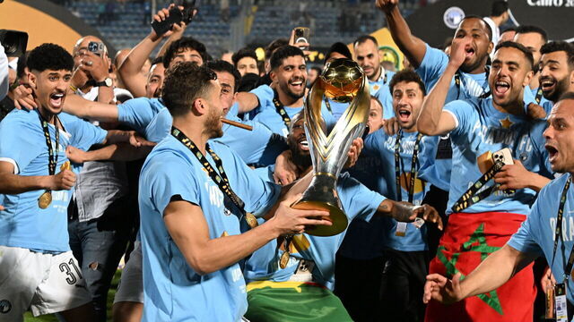 Pyramids' Egyptian forward #10 Ramadan Sobhi raises the trophy as Pyramids' players celebrate winning the CAF Champions League final football match between Pyramids FC and Mamelodi Sundowns at 30 June Stadium in Cairo on June 1, 2025.