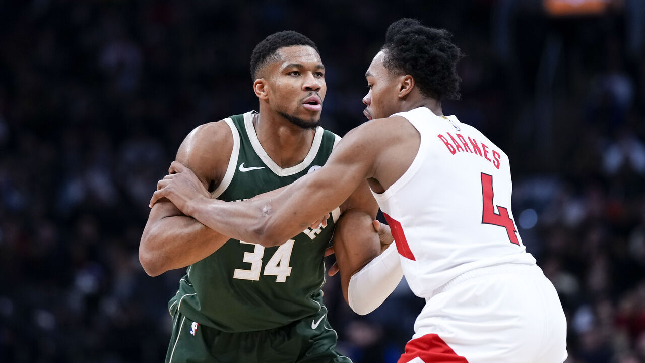 TORONTO, ON - JANUARY 6: Giannis Antetokounmpo #34 of the Milwaukee Bucks holds Scottie Barnes #4 of the Toronto Raptors at the Scotiabank Arena on January 6, 2025 in Toronto, Ontario, Canada. NOTE TO USER: User expressly acknowledges and agrees that, by downloading and/or using this Photograph, user is consenting to the terms and conditions of the Getty Images License Agreement.