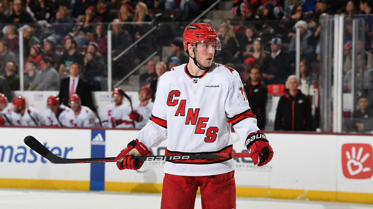 TEMPE, ARIZONA - FEBRUARY 16: Jesper Fast #71 of the Carolina Hurricanes gets ready during a face off against the Arizona Coyotes at Mullett Arena on February 16, 2024 in Tempe, Arizona.