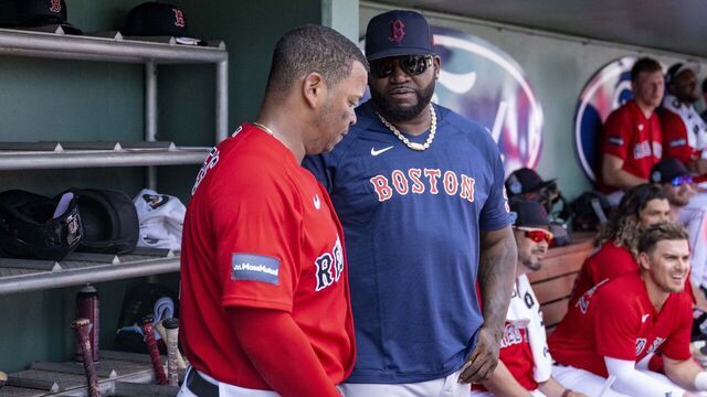 FT. MYERS, FL - MARCH 4: Rafael Devers #11 of the Boston Red Sox talks with former designated hitter David Ortiz during the second inning of a Spring Training Grapefruit League game against the Houston Astros on March 4, 2023 at JetBluePark at Fenway South in Fort Myers, Florida.