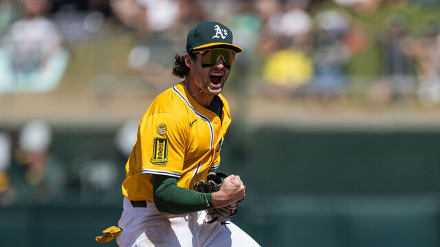 SACRAMENTO, CALIFORNIA - MAY 25: Jacob Wilson #5 of the Athletics celebrates after tagging out Johan Rojas #23 of the Philadelphia Phillies trying to steal second base to end the game in the top of the 9th inning at Sutter Health Park on May 25, 2025 in Sacramento, California.
