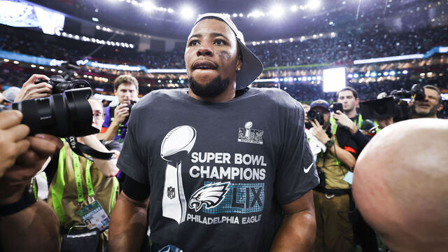 NEW ORLEANS, LOUISIANA - FEBRUARY 09: Saquon Barkley (26) of the Philadelphia Eagles celebrates on the field after Super Bowl LIX against the Kansas City Chiefs at Caesars Superdome on February 09, 2025, in New Orleans, Louisiana. The Eagles defeated the Chiefs 40-22.