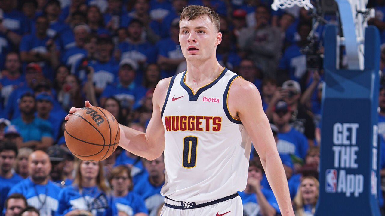 OKLAHOMA CITY, OK - MAY 18: Christian Braun #0 of the Denver Nuggets dribbles the ball during the game against the Oklahoma City Thunder during Round 2 Game 7 of the 2025 NBA Playoffs on May 18, 2025 at Paycom Center in Oklahoma City, Oklahoma. Mandatory Copyright Notice: Copyright 2025 NBAE