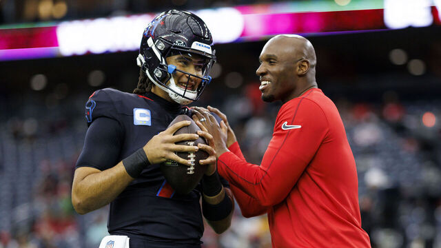 HOUSTON, TEXAS - DECEMBER 25: Quarterback C.J. Stroud #7 of the Houston Texans stands on the field with head coach DeMeco Ryans prior to an NFL football game against the Baltimore Ravens, at NRG Stadium on December 25, 2024 in Houston, Texas.