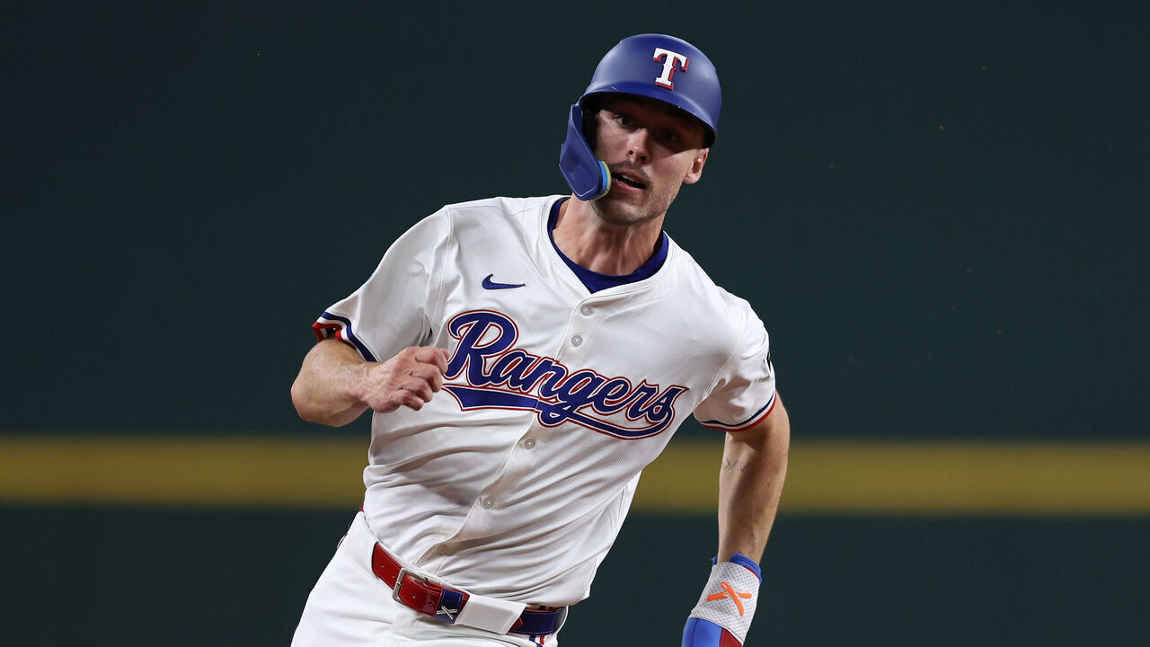 ARLINGTON, TEXAS - MAY 14: Evan Carter #32 of the Texas Rangers runs the bases during the fifth inning against the Colorado Rockies at Globe Life Field on May 14, 2025 in Arlington, Texas.