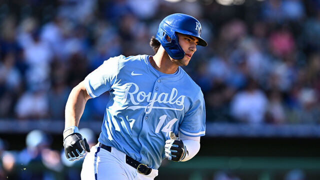 SURPRISE, ARIZONA - FEBRUARY 21, 2025: Jac Caglianone #14 of the Kansas City Royals runs out a fly ball during the eighth inning of a spring training game against the Texas Rangers at Surprise Stadium on February 21, 2025 in Surprise, Arizona.