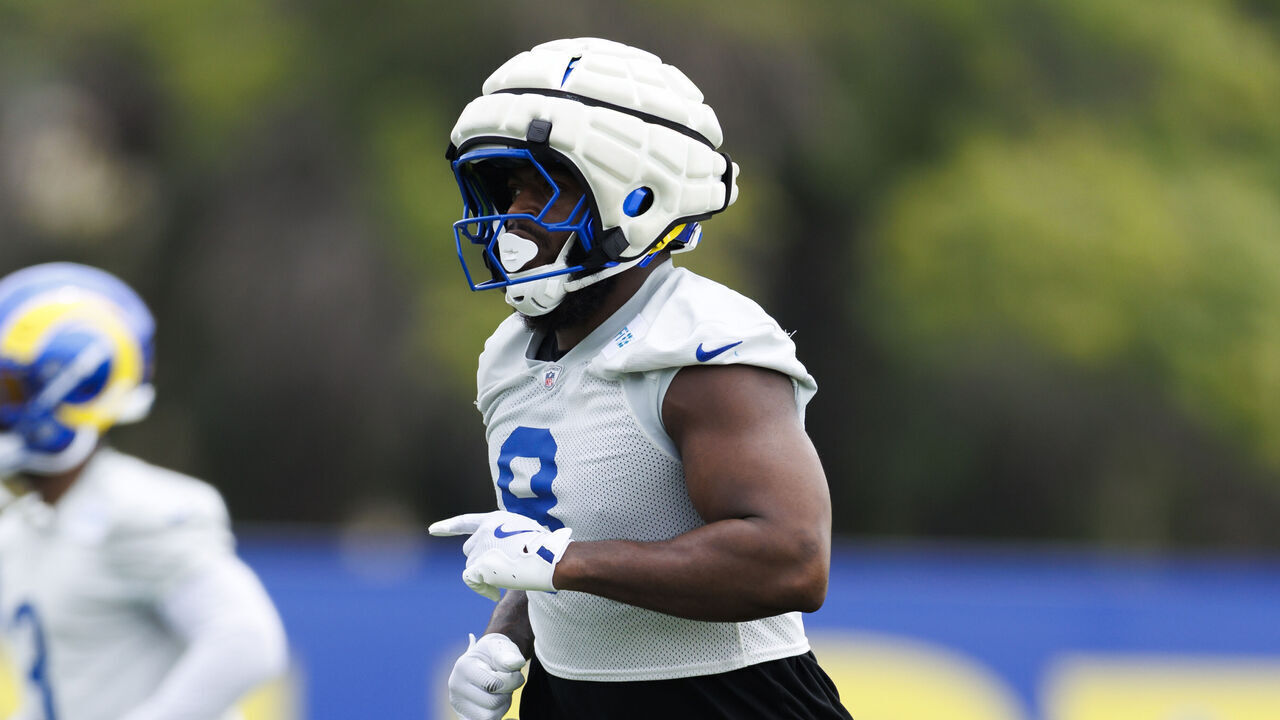 WOODLAND HILLS, CALIFORNIA - MAY 28: Jared Verse #8 of the Los Angeles Rams defends during an OTA offseason workout on May 28, 2025 in Woodland Hills, California.
