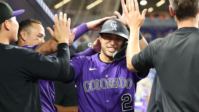 MIAMI, FL - JUNE 03: Colorado Rockies outfielder Tyler Freeman (2) gets high fives in the dugout after scoring a run in the fifth inning during the game between the Colorado Rockies and the Miami Marlins on Tuesday, June 3, 2025 at LoanDepot Park in Miami, FL.