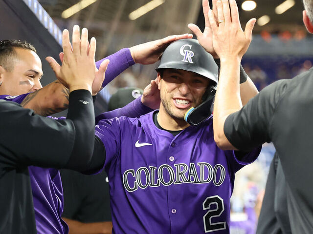 MIAMI, FL - JUNE 03: Colorado Rockies outfielder Tyler Freeman (2) gets high fives in the dugout after scoring a run in the fifth inning during the game between the Colorado Rockies and the Miami Marlins on Tuesday, June 3, 2025 at LoanDepot Park in Miami, FL.