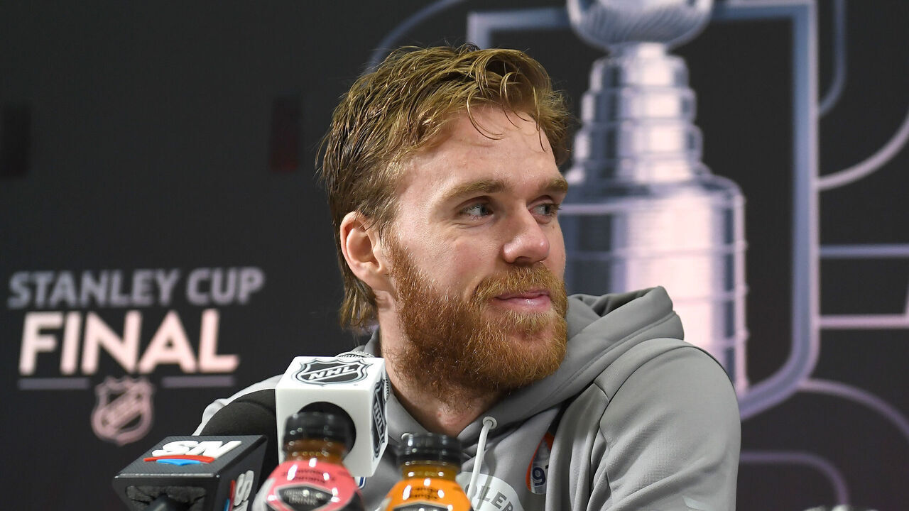 EDMONTON, ALBERTA - JUNE 03: Connor McDavid #97 of the Edmonton Oilers speaks with the media prior to the start of the 2025 NHL Stanley Cup Final against the Florida Panthers at Rogers Place on June 03, 2025 in Edmonton, Alberta.
