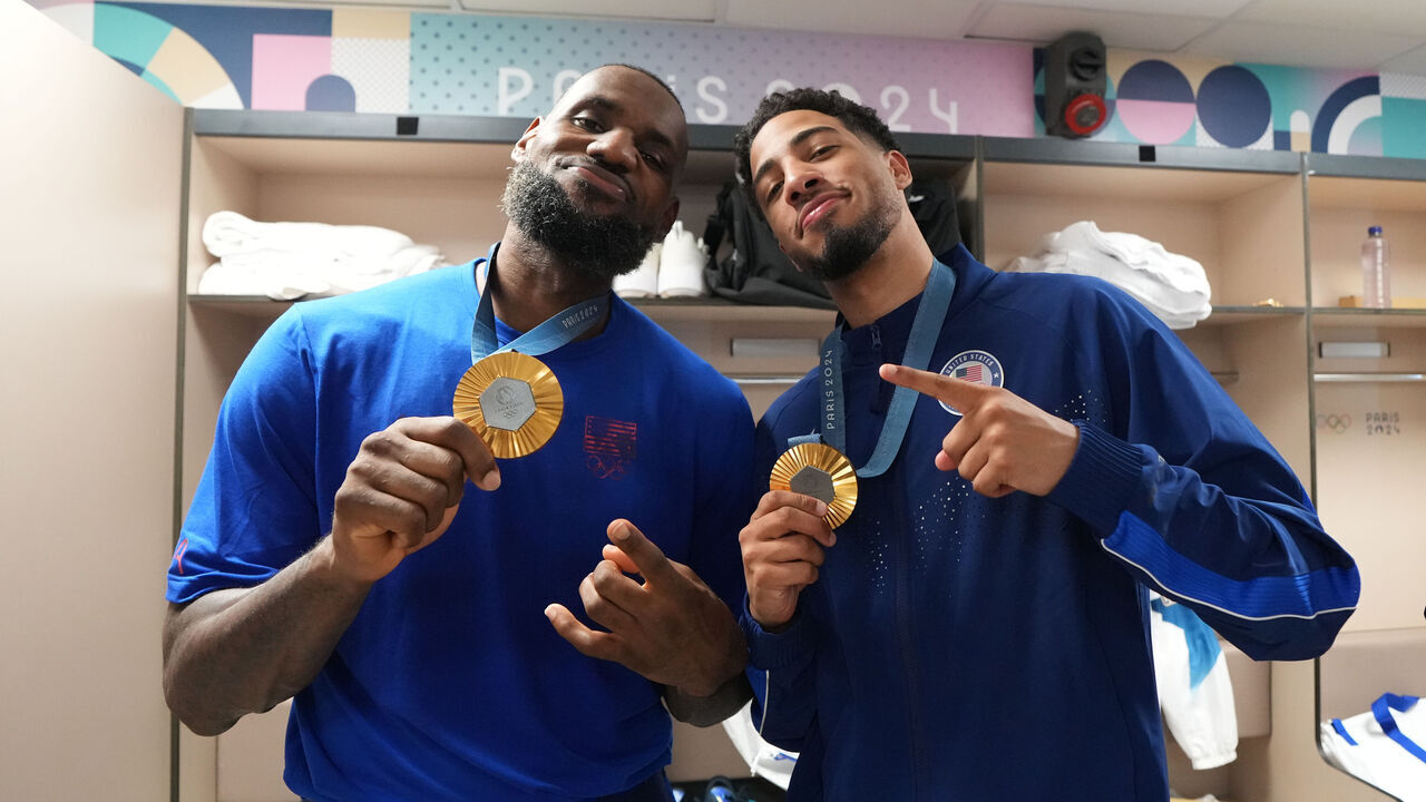 PARIS, FRANCE - AUGUST 10: LeBron James #6 and Tyrese Haliburton #9 of Team USA pose for a photo after winning the Men's Gold Medal Game on August 10, 2024 at the AccorHotels Arena in Paris, France. NOTE TO USER: User expressly acknowledges and agrees that, by downloading and/or using this photograph, user is consenting to the terms and conditions of the Getty Images License Agreement. Mandatory Copyright Notice: Copyright 2024 NBAE