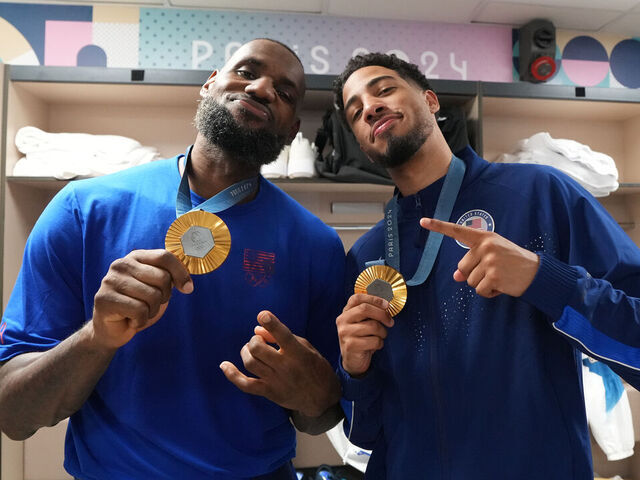 PARIS, FRANCE - AUGUST 10: LeBron James #6 and Tyrese Haliburton #9 of Team USA pose for a photo after winning the Men's Gold Medal Game on August 10, 2024 at the AccorHotels Arena in Paris, France. NOTE TO USER: User expressly acknowledges and agrees that, by downloading and/or using this photograph, user is consenting to the terms and conditions of the Getty Images License Agreement. Mandatory Copyright Notice: Copyright 2024 NBAE