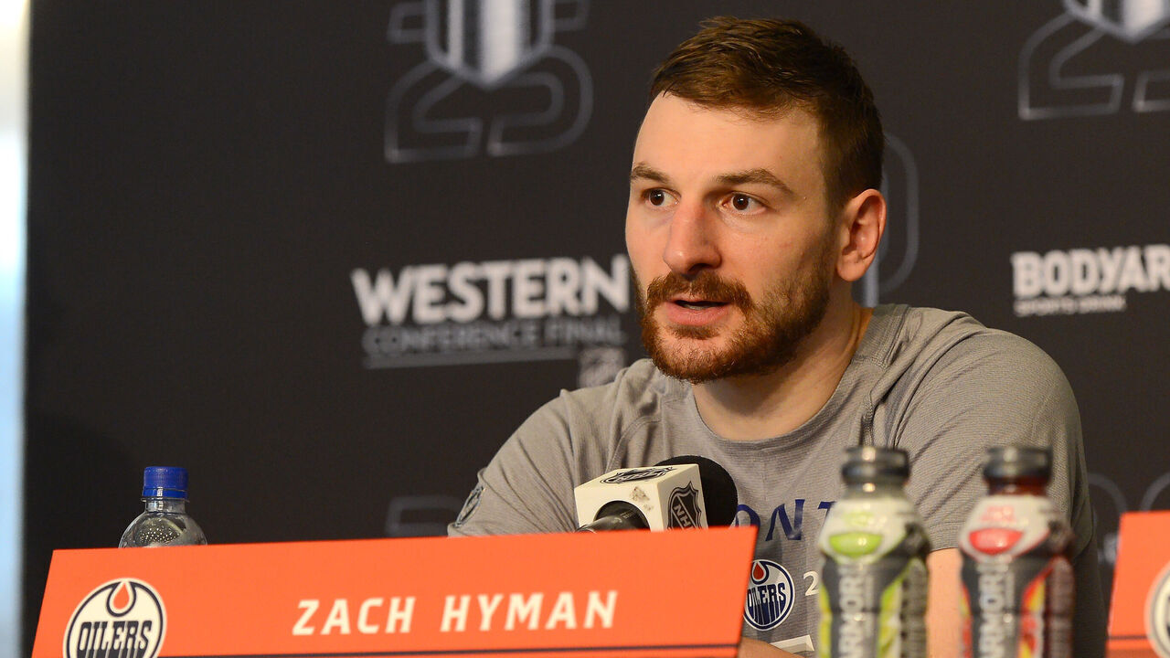 EDMONTON, CANADA - MAY 12: Zach Hyman #18 of the Edmonton Oilers addresses the media after his team's victory against the Dallas Stars in Game Three of the Western Conference Finals of the 2025 Stanley Cup Playoffs at Rogers Place on May 12, 2025, in Edmonton, Alberta, Canada.
