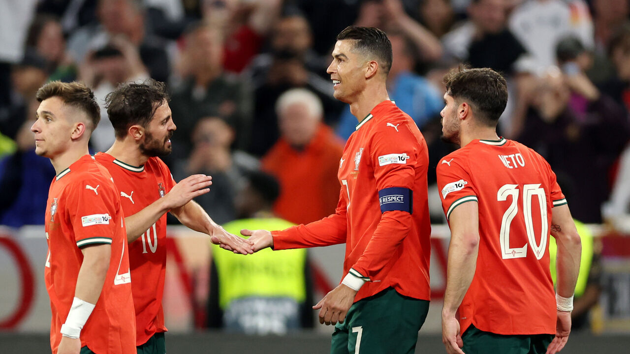 MUNICH, GERMANY - JUNE 4: Cristiano Ronaldo of Portugal celebrates 1-2 with Bernardo Silva of Portugal, Francisco Conceicao of Portugal, Pedro Neto of Portugal during the UEFA Nations league match between Germany v Portugal at the Allianz Arena on June 4, 2025 in Munich Germany