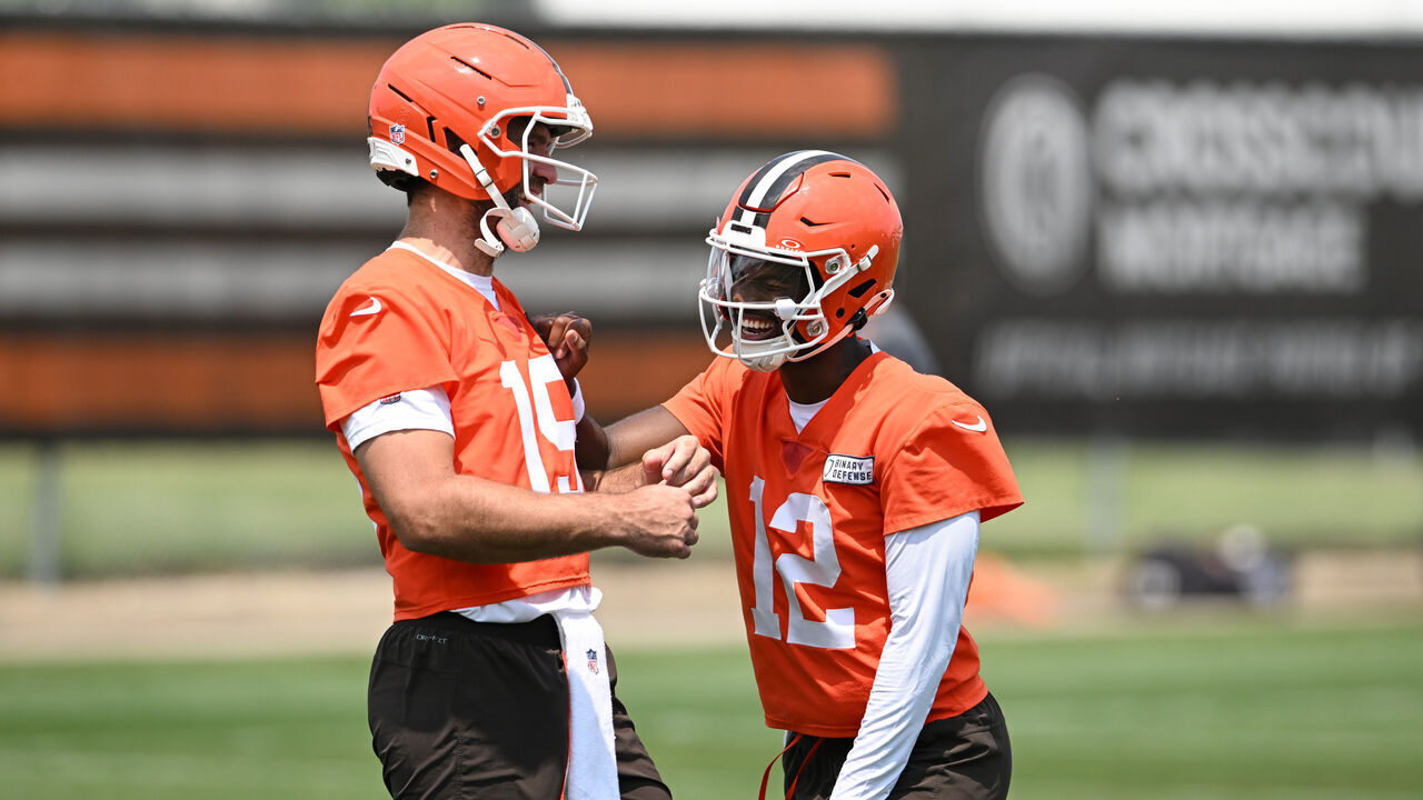 BEREA, OHIO - JUNE 04: Joe Flacco #15 and Shedeur Sanders #12 of the Cleveland Browns laugh during Cleveland Browns OTA offseason workouts at CrossCountry Mortgage Campus on June 04, 2025 in Berea, Ohio.
