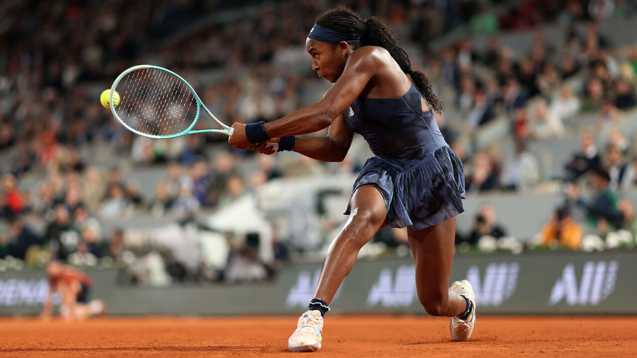 PARIS, FRANCE - JUNE 05: Coco Gauff of United States plays a backhand against Lois Boisson of France in the Women's Singles Semi Final match on Day Twelve of the 2025 French Open at Roland Garros on June 05, 2025 in Paris, France.