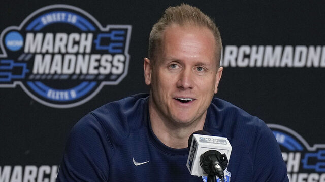 NEWARK, NJ - MARCH 26: Head coach Kevin Young of the BYU Cougars speaks during media interviews before the East Regional Sweet Sixteen of the NCAA Men's Basketball Tournament at Prudential Center, on March 26, 2025 in Newark, NJ.