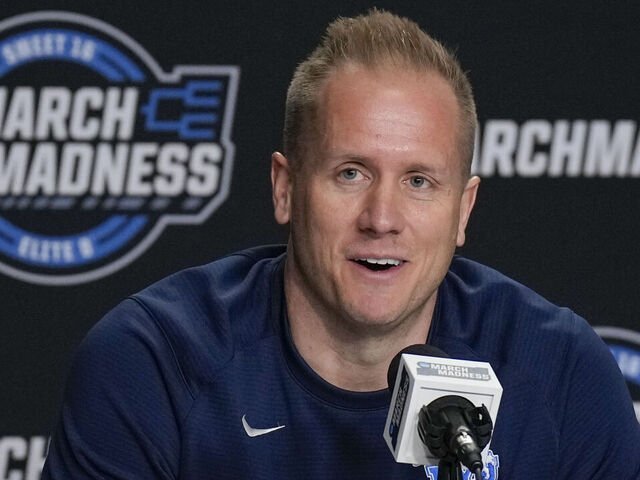 NEWARK, NJ - MARCH 26: Head coach Kevin Young of the BYU Cougars speaks during media interviews before the East Regional Sweet Sixteen of the NCAA Men's Basketball Tournament at Prudential Center, on March 26, 2025 in Newark, NJ.