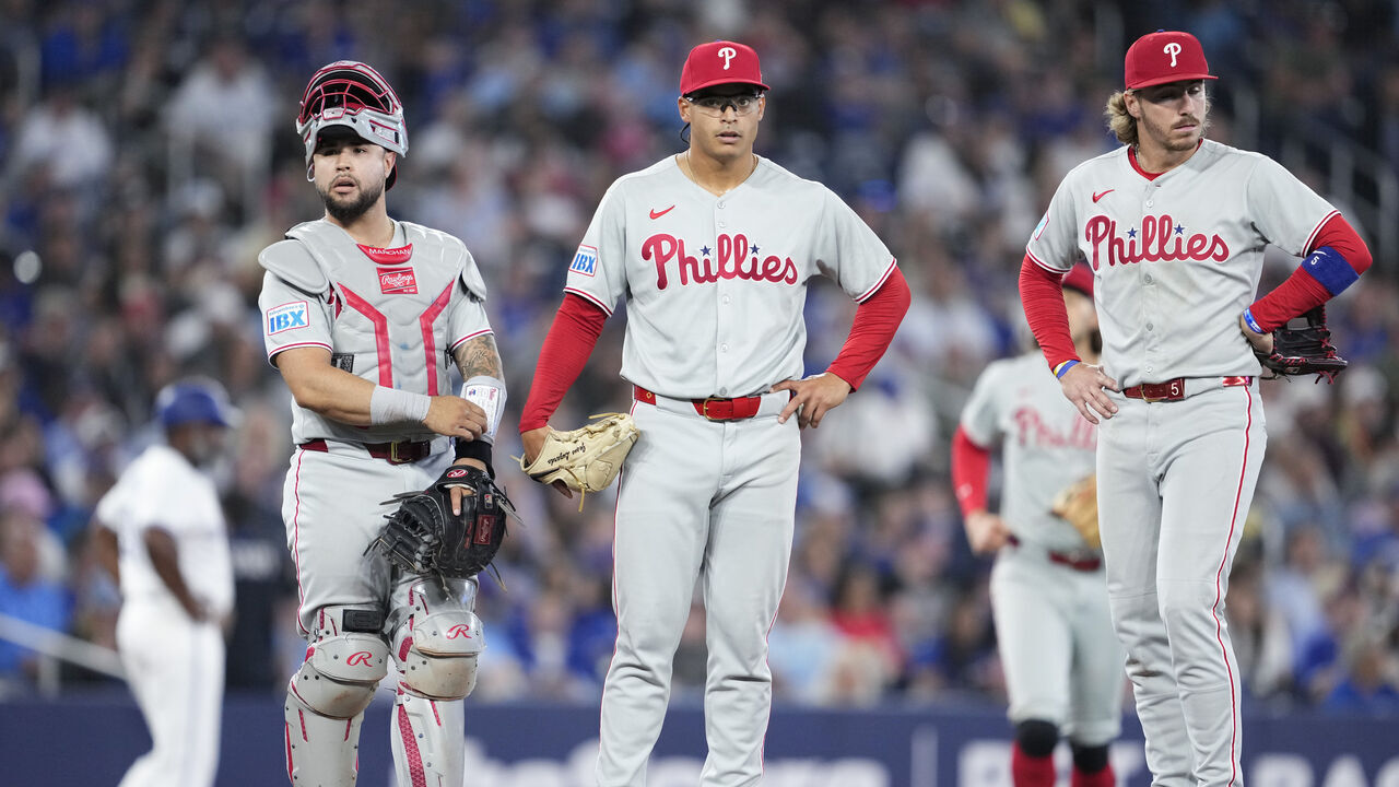 TORONTO, ON - JUNE 5: Jesus Luzardo #44 of the Philadelphia Phillies awaits being taken out of the game against the Toronto Blue Jays with teammates Rafael Marchan #13 and Bryson Stott #5 against the Toronto Blue Jays during the third inning in their MLB game at the Rogers Centre on June 5, 2025 in Toronto, Ontario, Canada.