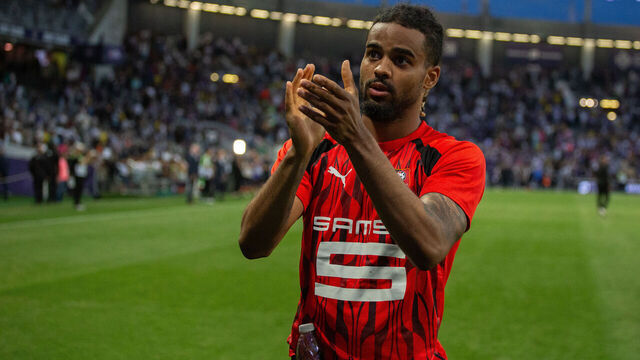 TOULOUSE, FRANCE - MAY 03: Lorenz Assignon of Stade Rennais celebrates during the Ligue 1 McDonald's match between Toulouse FC and Stade Rennais at the TFC Stadium on May 03, 2025 in Toulouse, France.