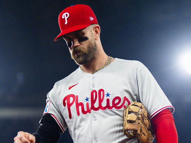 TORONTO, ON - JUNE 4: Bryce Harper #3 of the Philadelphia Phillies walks to the dugout in a break in play against the Toronto Blue Jays in their MLB game at the Rogers Centre on June 4, 2025 in Toronto, Ontario, Canada.