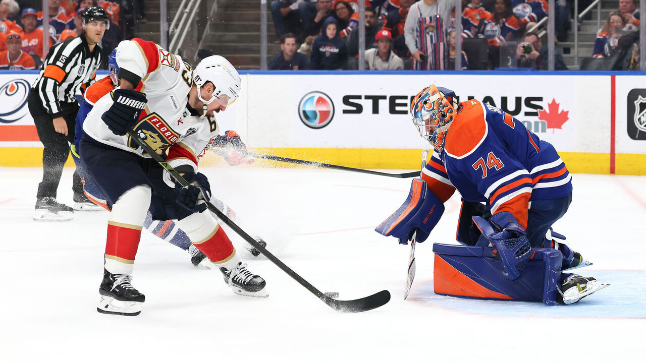EDMONTON, CANADA - JUNE 06: Brad Marchand #63 of the Florida Panthers scores against Stuart Skinner #74 of the Edmonton Oilers during the second overtime period in Game Two of the 2025 Stanley Cup Final at Rogers Place on June 06, 2025 in Edmonton, Alberta, Canada.