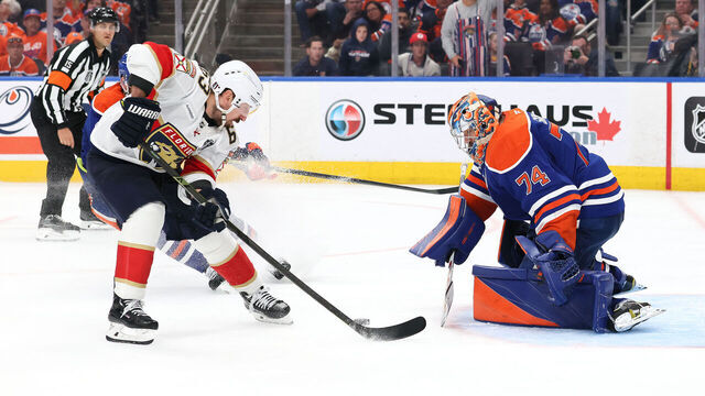 EDMONTON, CANADA - JUNE 06: Brad Marchand #63 of the Florida Panthers scores against Stuart Skinner #74 of the Edmonton Oilers during the second overtime period in Game Two of the 2025 Stanley Cup Final at Rogers Place on June 06, 2025 in Edmonton, Alberta, Canada.