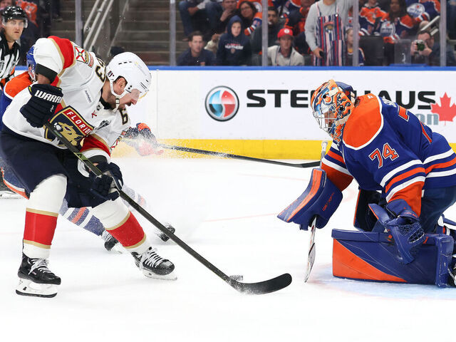 EDMONTON, CANADA - JUNE 06: Brad Marchand #63 of the Florida Panthers scores against Stuart Skinner #74 of the Edmonton Oilers during the second overtime period in Game Two of the 2025 Stanley Cup Final at Rogers Place on June 06, 2025 in Edmonton, Alberta, Canada.