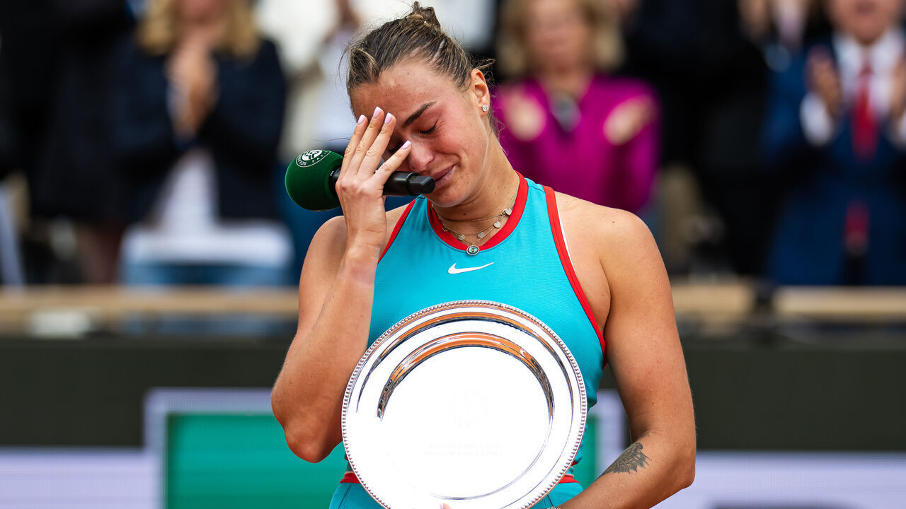 PARIS, FRANCE - JUNE 07: Aryna Sabalenka during the trophy ceremony after losing to Coco Gauff of the United States in the womens singles final on Day Fourteen of the French Open at Roland Garros on June 07, 2025 in Paris, France