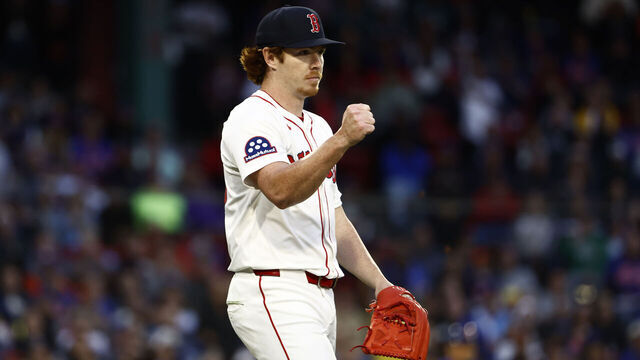 BOSTON, MA - MAY 19: Pitcher Hunter Dobbins #73 of the Boston Red Sox reacts after a double play against the New York Mets ended the third inning at Fenway Park on May 19, 2025 in Boston, Massachusetts.