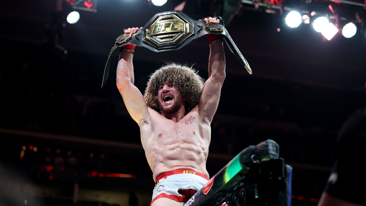 NEWARK, NEW JERSEY - JUNE 07: Merab Dvalishvili of Georgia celebrates after defeating Sean O'Malley of the United States in the bantamweight title bout during UFC 316 at the Prudential Center on June 07, 2025 in Newark, New Jersey.