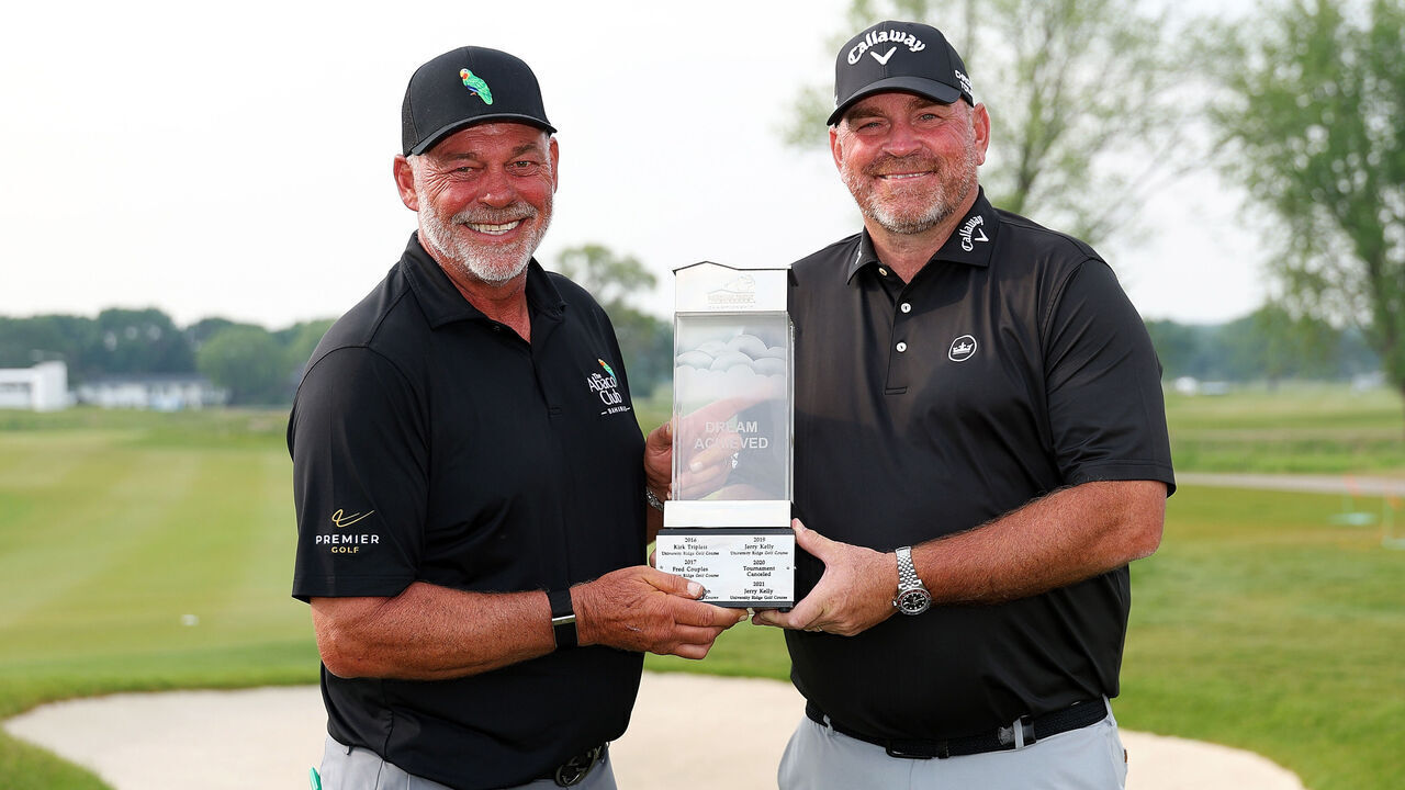 MADISON, WISCONSIN - JUNE 08: Darren Clarke of Northern Ireland (L) and Thomas Bjorn of Denmark pose with the trophy on the 18th hole after winning the American Family Insurance Championship 2025 at TPC Wisconsin on June 08, 2025 in Madison, Wisconsin.