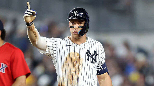 NEW YORK, NEW YORK - JUNE 06: Aaron Judge #99 of the New York Yankees reacts after advancing to second base after an RBI single against the Boston Red Sox during the fifth inning at Yankee Stadium on June 06, 2025 in the Bronx borough of New York City.