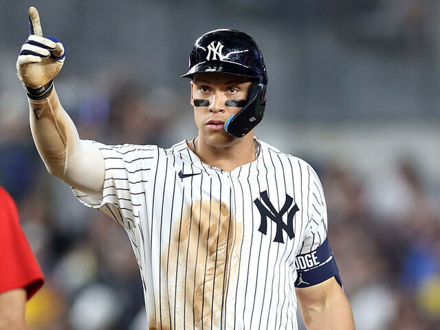 NEW YORK, NEW YORK - JUNE 06: Aaron Judge #99 of the New York Yankees reacts after advancing to second base after an RBI single against the Boston Red Sox during the fifth inning at Yankee Stadium on June 06, 2025 in the Bronx borough of New York City.