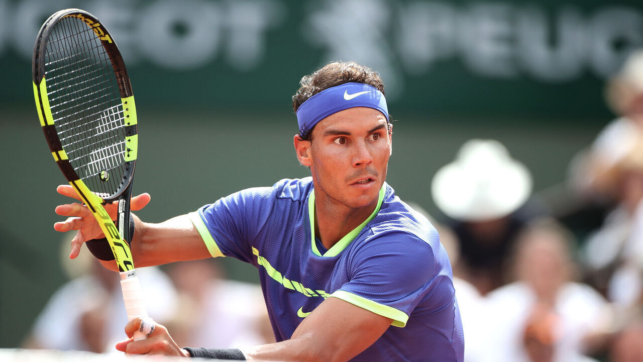 2017 French Open Tennis Tournament - Day Fifteen. Rafael Nadal of Spain in action against Stan Wawrinka of Switzerland in the Men's Singles Final match on Philippe-Chatrier Court at the 2017 French Open Tennis Tournament at Roland Garros on June 11th, 2017 in Paris, France.