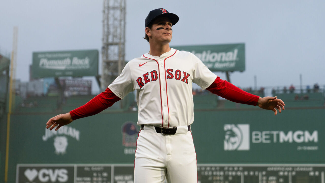 BOSTON, MA - JUNE 09: Number one overall prospect Roman Anthony #48 of the Boston Red Sox warms up on the field before his Major League Baseball debut prior to the game between the Tampa Bay Rays and the Boston Red Sox at Fenway Park on Monday, June 9, 2025 in Boston, Massachusetts.