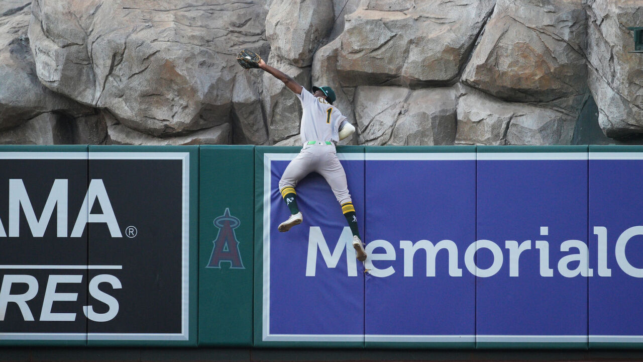 ANAHEIM, CA - JUNE 09: Denzel Clarke #1 of the Athletics makes a catch in the outfield during the game between the Athletics and the Los Angeles Angels at Angel Stadium of Anaheim on Monday, June 9, 2025 in Anaheim, California.
