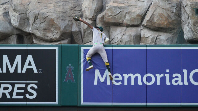 ANAHEIM, CA - JUNE 09: Denzel Clarke #1 of the Athletics makes a catch in the outfield during the game between the Athletics and the Los Angeles Angels at Angel Stadium of Anaheim on Monday, June 9, 2025 in Anaheim, California.