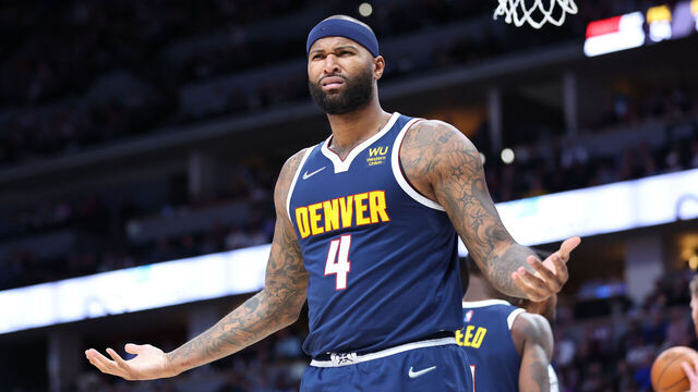 DENVER, CO - APRIL 05: DeMarcus Cousins #4 of the Denver Nuggets reacts against the San Antonio Spurs during the second quarter at Ball Arena on April 5, 2022 in Denver, Colorado.
