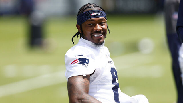 Foxborough, MA - June 2: New England Patriots wide receiver Stefon Diggs stretches during an OTA offseason workout at Gillette Stadium on June 2, 2025.