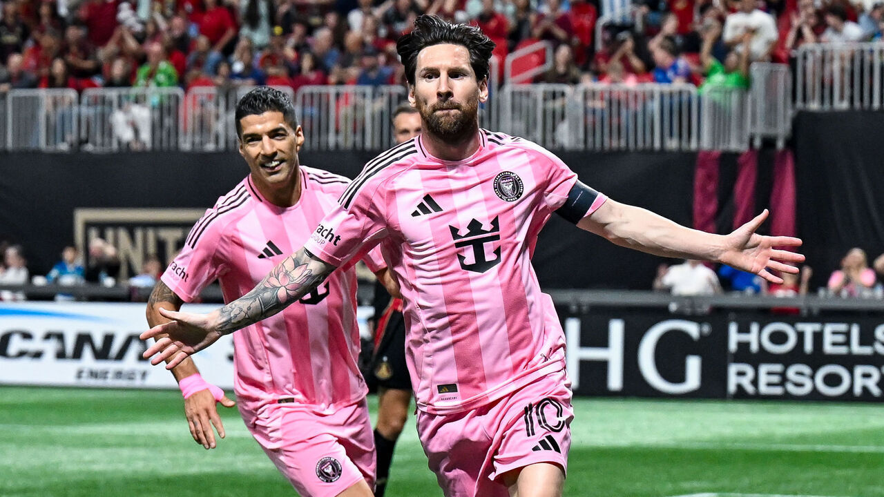 ATLANTA, GA MARCH 16: Lionel Messi #10 and Luis Suarez #9 of Inter Miami react after Messi's first-half goal during the MLS match between Inter Miami CF and Atlanta United FC on March 16th, 2025 at Mercedes-Benz Stadium in Atlanta, GA.