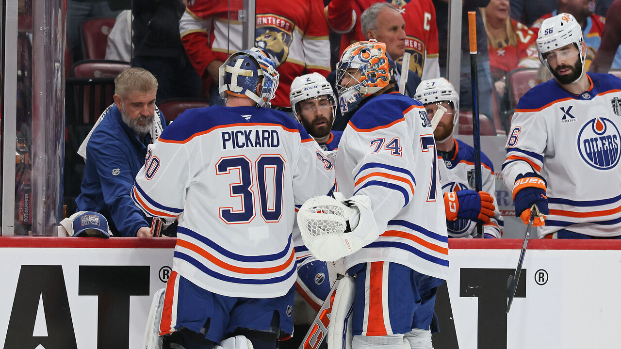SUNRISE, FLORIDA - JUNE 09: Calvin Pickard #30 takes to the ice as Stuart Skinner #74 of the Edmonton Oilers is benched during the third period against the Florida Panthers in Game Three of the 2025 Stanley Cup Final at Amerant Bank Arena on June 09, 2025 in Sunrise, Florida.